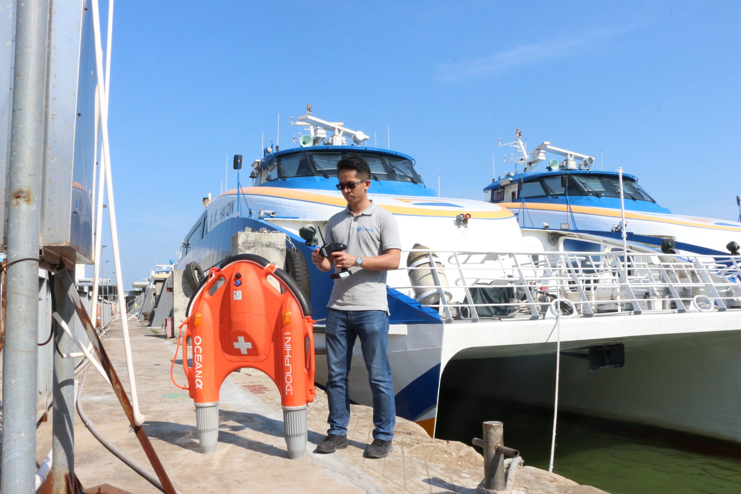 2 Staff set up the Dolphin 1 on shore