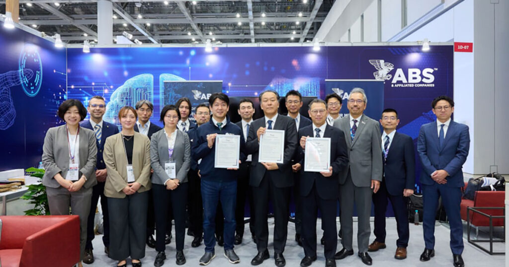 Attendees gather at an ABS Approval in Principle (AIP) certificate ceremony during the 2026 Sea Japan International Maritime Exhibition and Conference. Pictured holding ABS AIP certificates (L to R): Kojiro Hatada, President and CEO, Innovative Space Carrier Inc. (ISC); Hiroyuki Kakehashi, Associate Executive Officer, Mitsui O.S.K. Lines, Ltd. (MOL); and Kenichi Shibata, President and Representative Director, TSUNEISHI SOLUTIONS TOKYOBAY Co., Ltd. (T-SOL). Also pictured: Timoteo Badalotti, ABS Principal Engineer, Global Sustainability (second from left); and Makoto Oba, ABS Director, Japan Business Development (third from right).