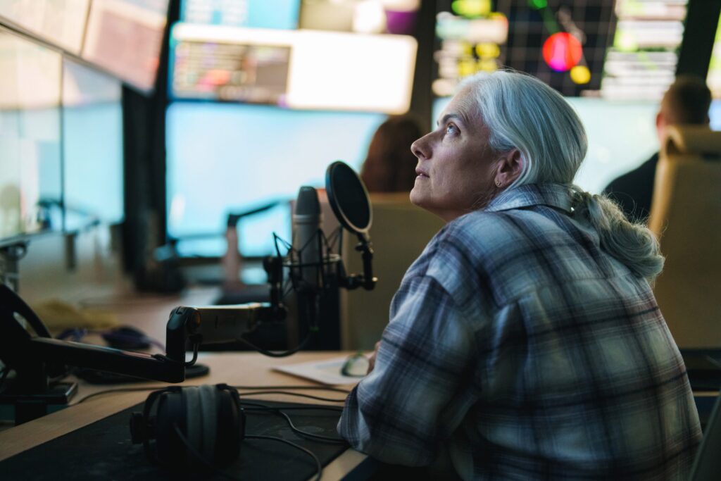 Anitra Ingalls (Chief Scientist and Professor, University of Washington) watches the ROV screens in Mission Control on the ship during a dive.