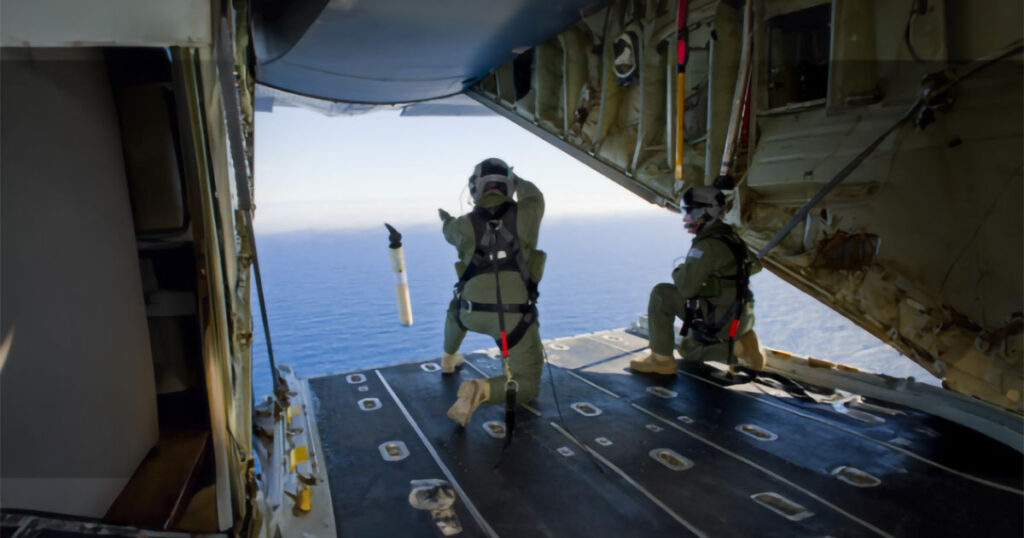 Member of the US Coast Guard Deploys iSLDMB from Aircraft During Search and Rescue Operation.