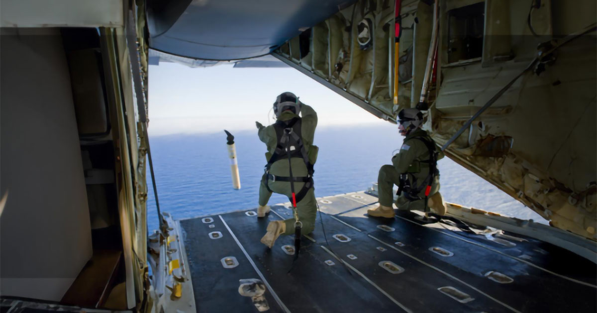 Member of the US Coast Guard Deploys iSLDMB from Aircraft During Search and Rescue Operation.