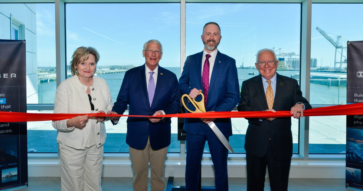 Office opening ribbon cutting.