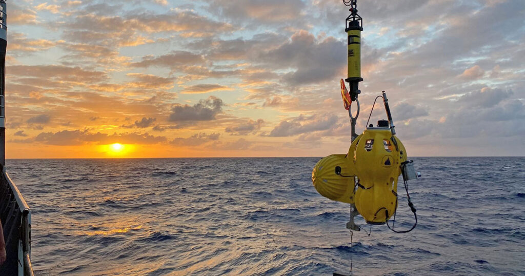 An ocean bottom seismometer is being deployed by the Ocean Bottom Seismic Instrument Center during a research expedition to the Gofar transform fault in the Pacific Ocean.