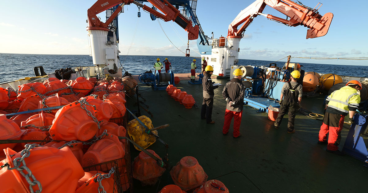Oceanographic moorings are prepared for deployment in the North Atlantic.
