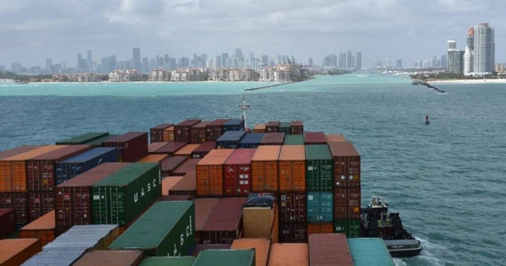 A cargo ship safely entering the port of Miami in Florida.