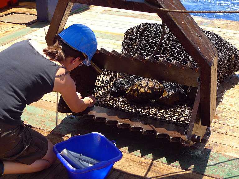 Now that the geophysical surveys have been completed, the geologists are taking over for the second part of the 'Hess Evolution' expedition. One of their most important pieces of equipment is the chain-bag dredge, which they use to collect rock samples from the seabed. 