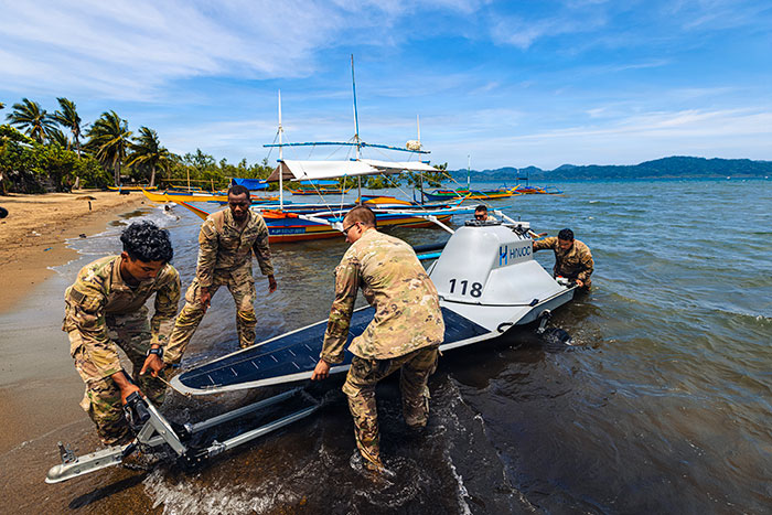 US Soldiers assigned to the 125th Intelligence and Electronic Warfare Battalion, 25th Infantry Division Artillery, 25th Infantry Division, recover an unmanned surface vessel during Exercise Salaknib 2026 at Casiguran, Philippines, June 9, 2026. 