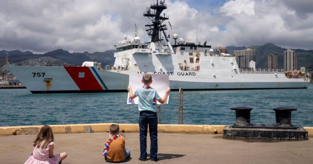 USCGC Midgett (WMSL 757) family members greet the cutter as it returns to home port at Coast Guard Base Honolulu, July 20, 2026.