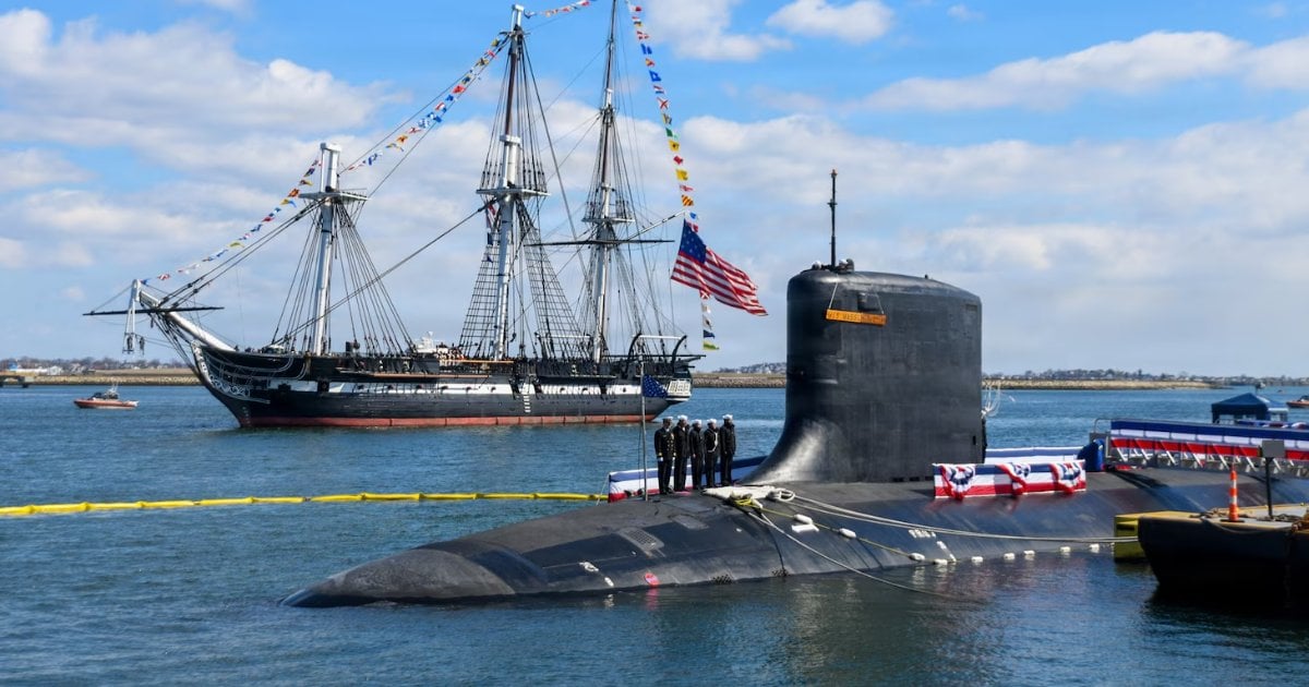 The USS Constitution sails past the Virginia-class nuclear-powered fast-attack submarine USS Massachusetts (SSN 798) during Massachusetts’ commissioning in Boston, on March 28th, 2026. Massachusetts is the newest fast-attack submarine and the fifth US Navy vessel to bear the name. (Image credit: Mass Communication Specialist 2nd Class Lucas J. Hastings, US Navy)