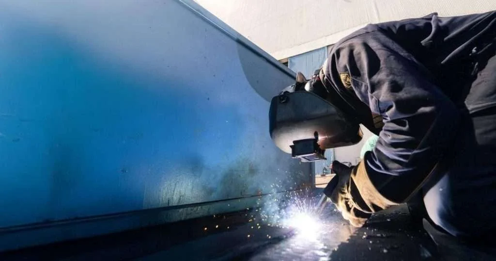 A welder works at HII’s Newport News Shipbuilding Charleston Operations site in Goose Creek, SC. (Image credit: Ashley Cowan, HII)