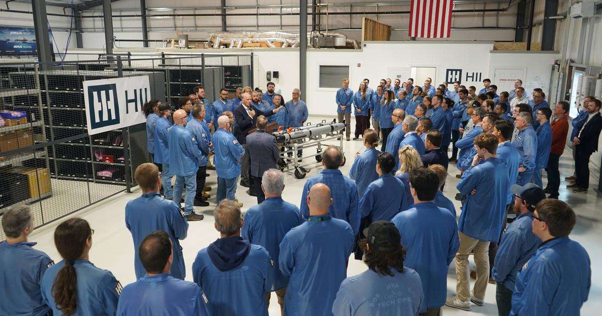 US Rep. Bill Keating joins ribbon-cutting celebrating expanded production capacity. (Credit: HII)