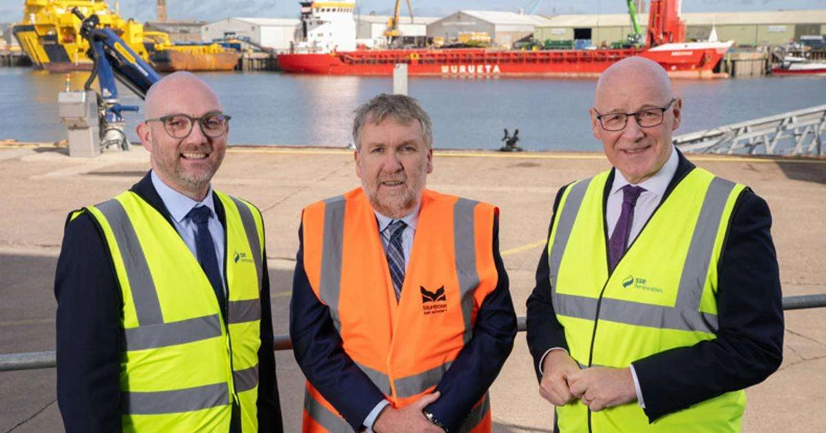 Stuart Hood, Director of Offshore Wind Operations at SSE Renewables; Tom Hutchison, CEO of Montrose Port Authority; and First Minister John Swinney standing at Montrose Port. (Image credit: SSE)