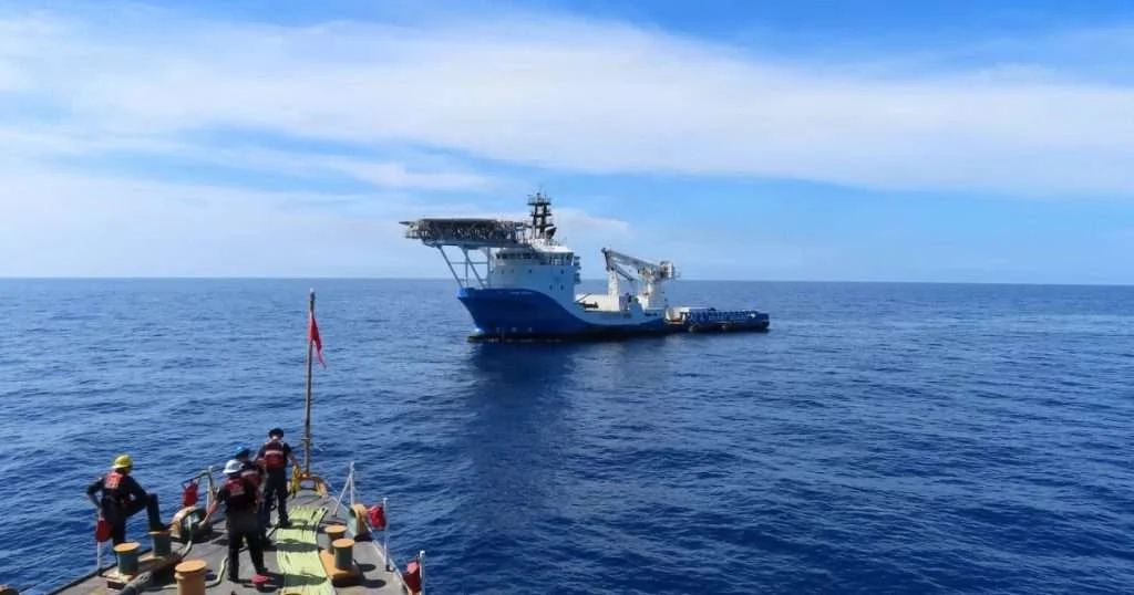 A Coast Guard Cutter Escanaba (WMEC 907) small boat crew approaches a suspected smuggling vessel in the Caribbean Sea, Aug. 29, 2026. The tactical boarding and search of the vessel resulted in the seizure of approximately 2,082 pounds of marijuana, valued at more than $2.4 million. (Image credit: Petty Officer 2nd Class Nadia Sands, US Coast Guard)