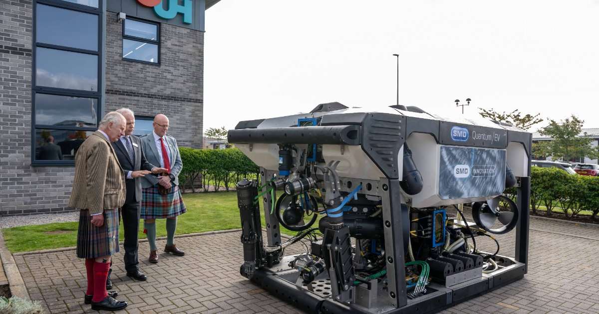 GUH Chief Executive Neil Gordon along with Board Member, Mike Jones of SMD introduces an all-electric ROV to His Majesty King Charles III during a visit to GUH’s Aberdeen office. (Image credit: GUH)