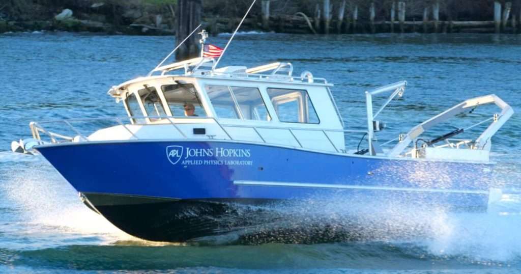 APL’s new 36-foot research vessel expands the Laboratory’s ability to test and evaluate emerging maritime technologies in realistic operational environments. Designed as a flexible, modular platform, the vessel supports autonomous systems, sensors, communications, and other mission-critical capabilities, helping researchers move innovations from the lab to the water faster. (Credit: Munson Boats)