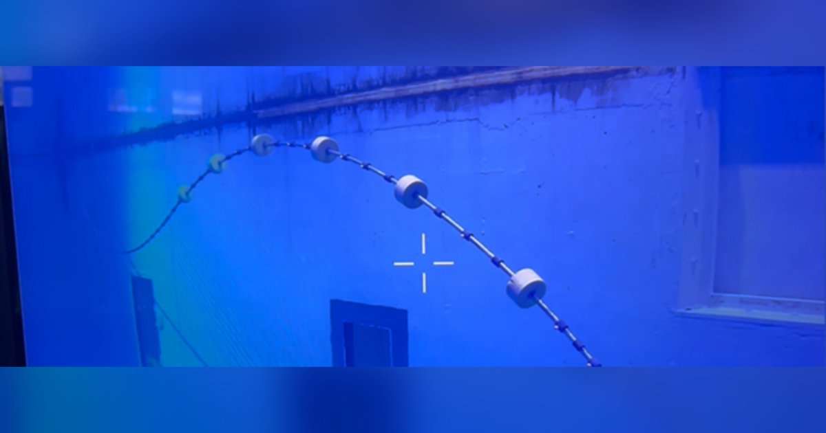 A lazy-wave riser model under testing in the Ocean basin laboratory at SINTEF. (Image credit: SINTEF)