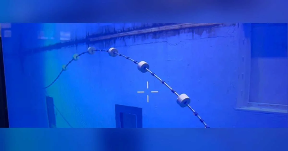 A lazy-wave riser model under testing in the Ocean basin laboratory at SINTEF. (Image credit: SINTEF)