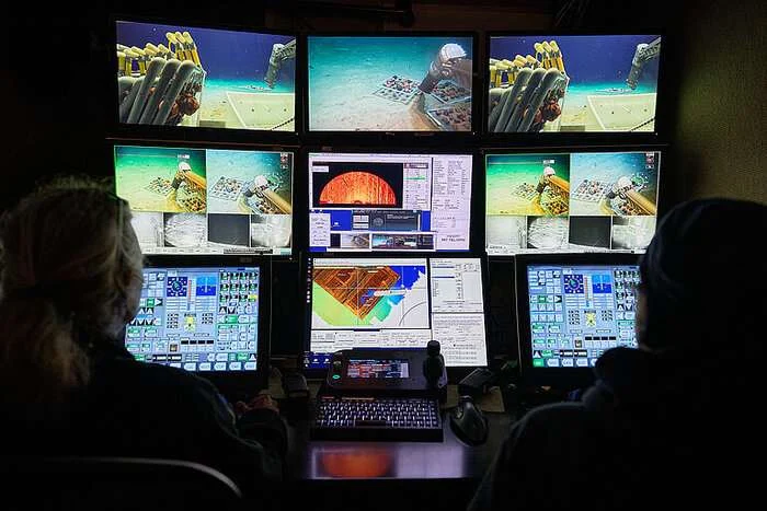 Researchers can monitor what the underwater robot sees on the seabed while on board the vessel. The expedition includes researchers from 17 institutions across seven European countries. Their disciplines range from biology and microbiology to chemistry, oceanography and geology. (Image credit: Tim Kalvelage)