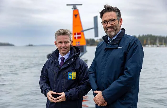 Pål Jonson, Sweden’s Minister for Defence, and Saildrone European Managing Director Robert Kleist at a media day hosted by the Swedish Defence Materiel Administration (FMV), on October 22, 2026, in Nynäshamn, Sweden. (Credit: Saildrone)