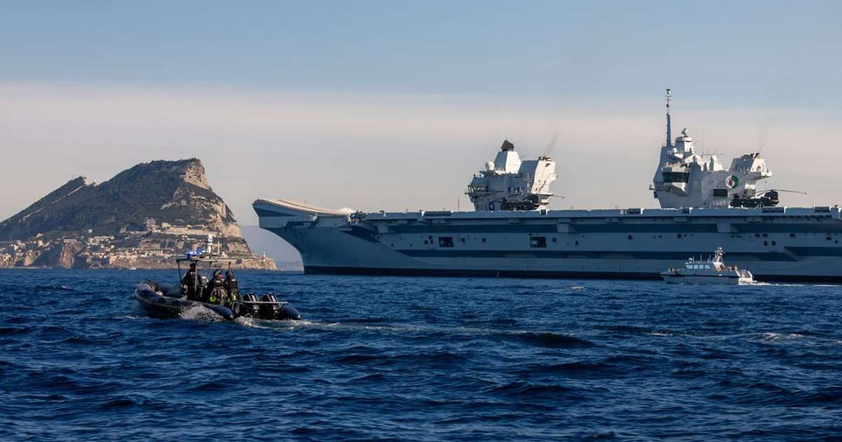 HMS Cutlass and a police launch meet up with HMS Queen Elizabeth off Gib
